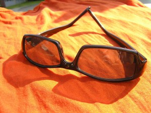 Sunglasses-on-a-blanket-by-Dasha-creative-commons